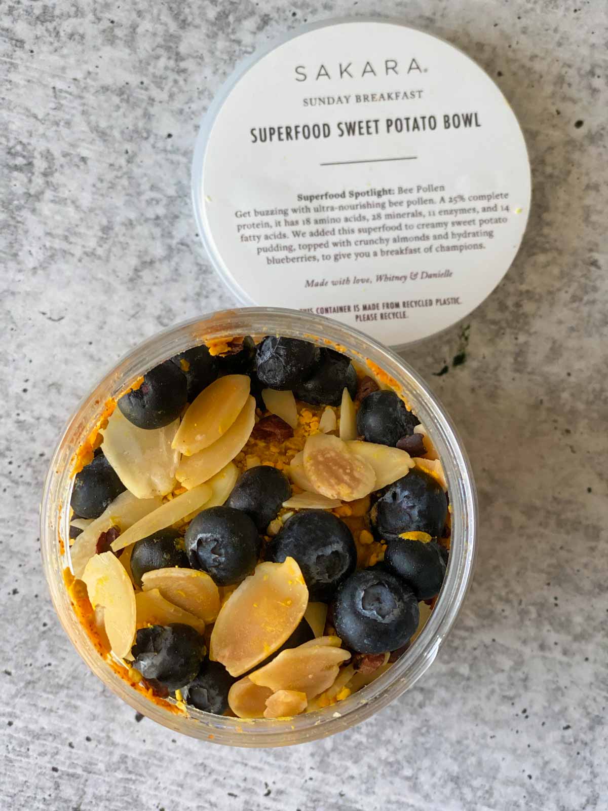 superfood sweet potato bowl breakfast with blueberries and bee pollen