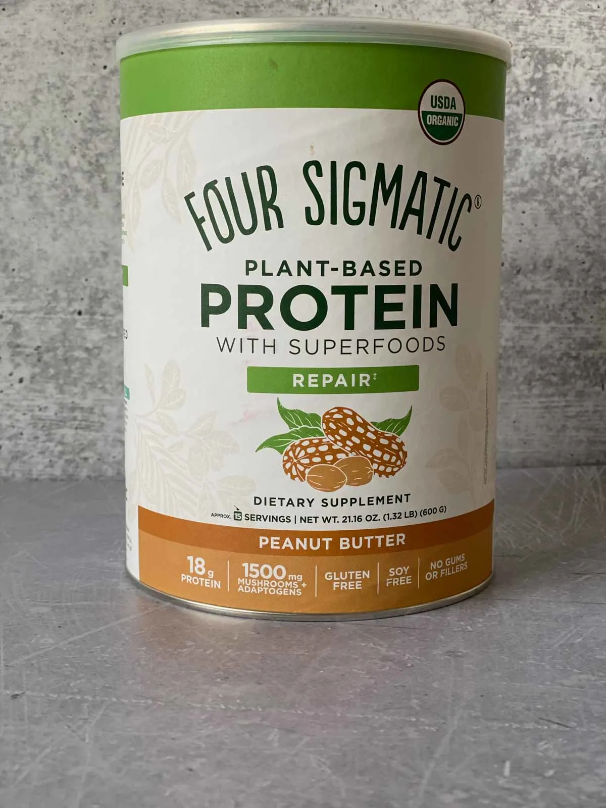 four sigmatic peanut butter protein canister