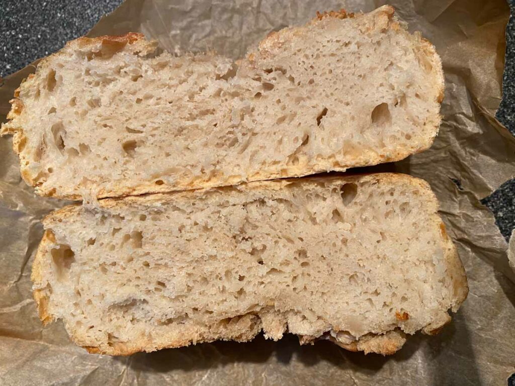 no-knead bread cut in half