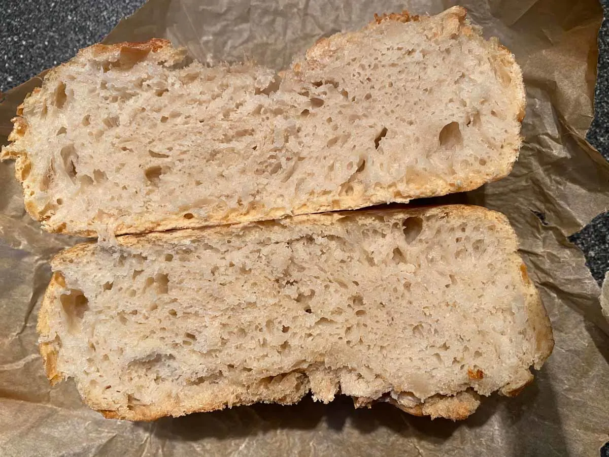 no-knead bread cut in half.
