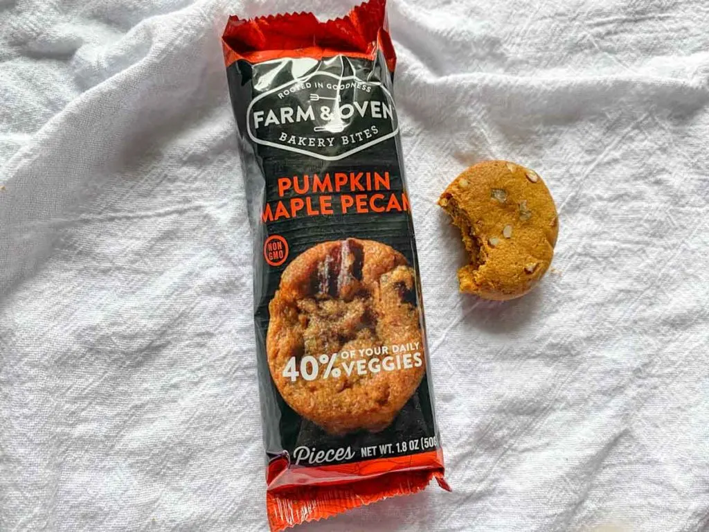 Pumpkin maple pecan flavor from Farm & oven with a bite out of one muffin