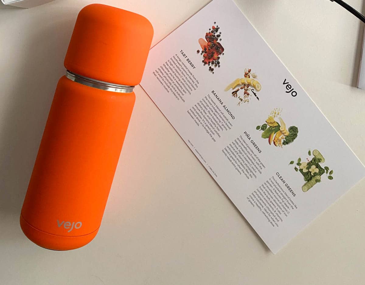 Vejo orange portable blender and starter pack flavor info card