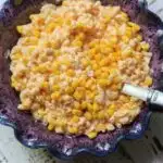 macaroni and cheese with corn in serving bowl