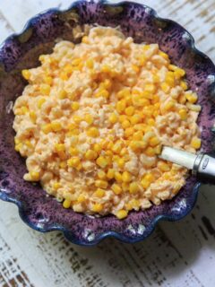 macaroni and cheese with corn in serving bowl