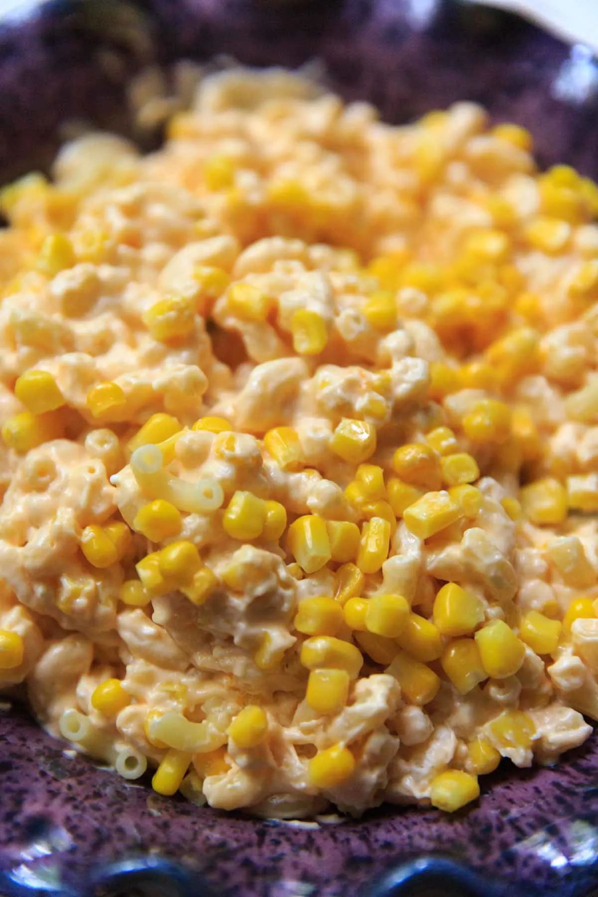 close up of macaroni and cheese with corn