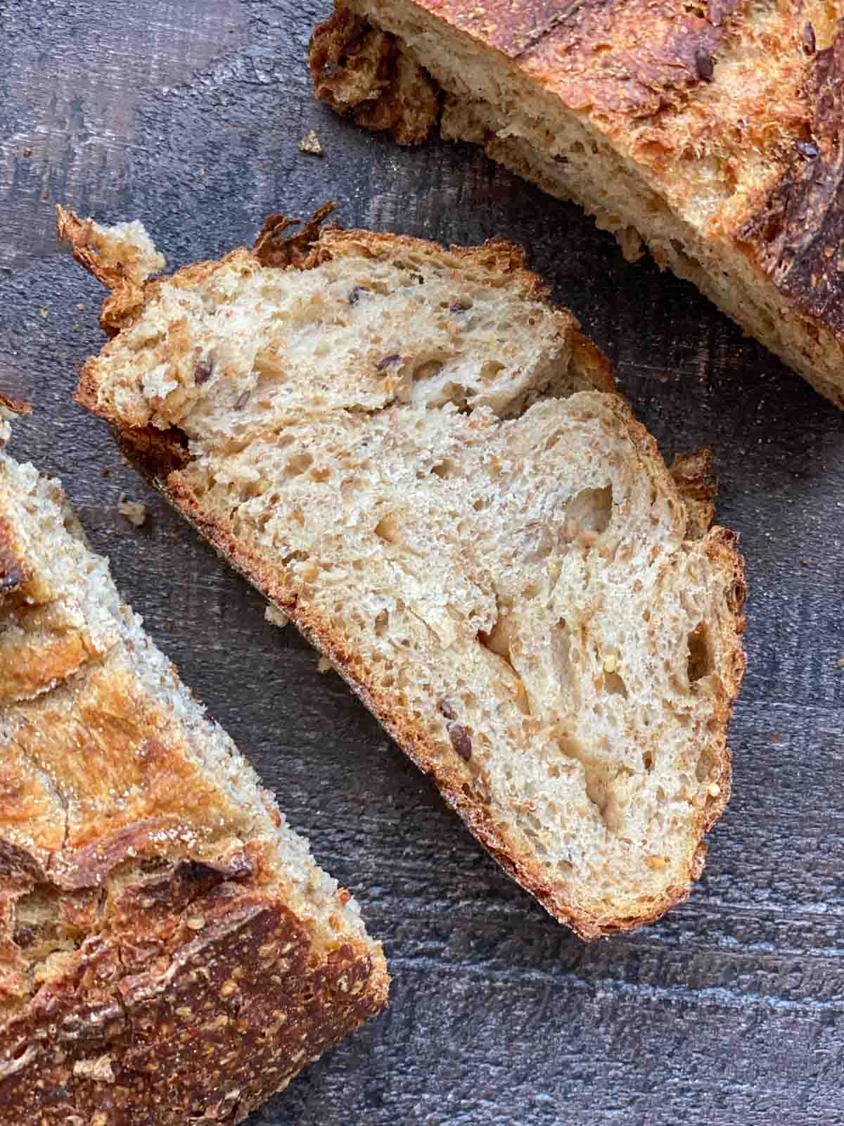 a slice of Wildgrain 7-grain sourdough bread