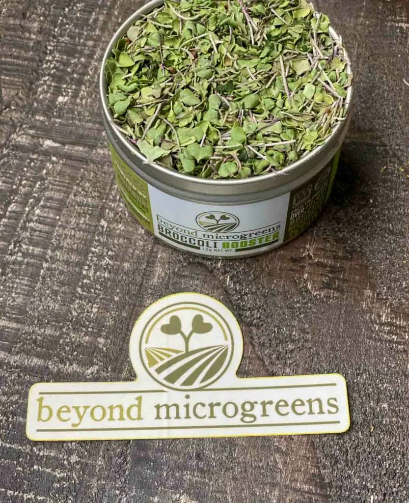 broccoli booster canister next to a beyond microgreens sticker