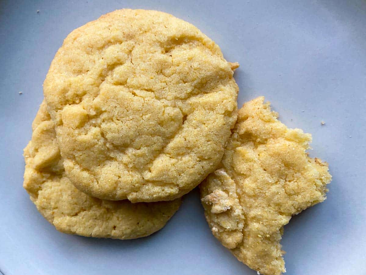 Trader Joe's corn cookies on plate with one half eaten