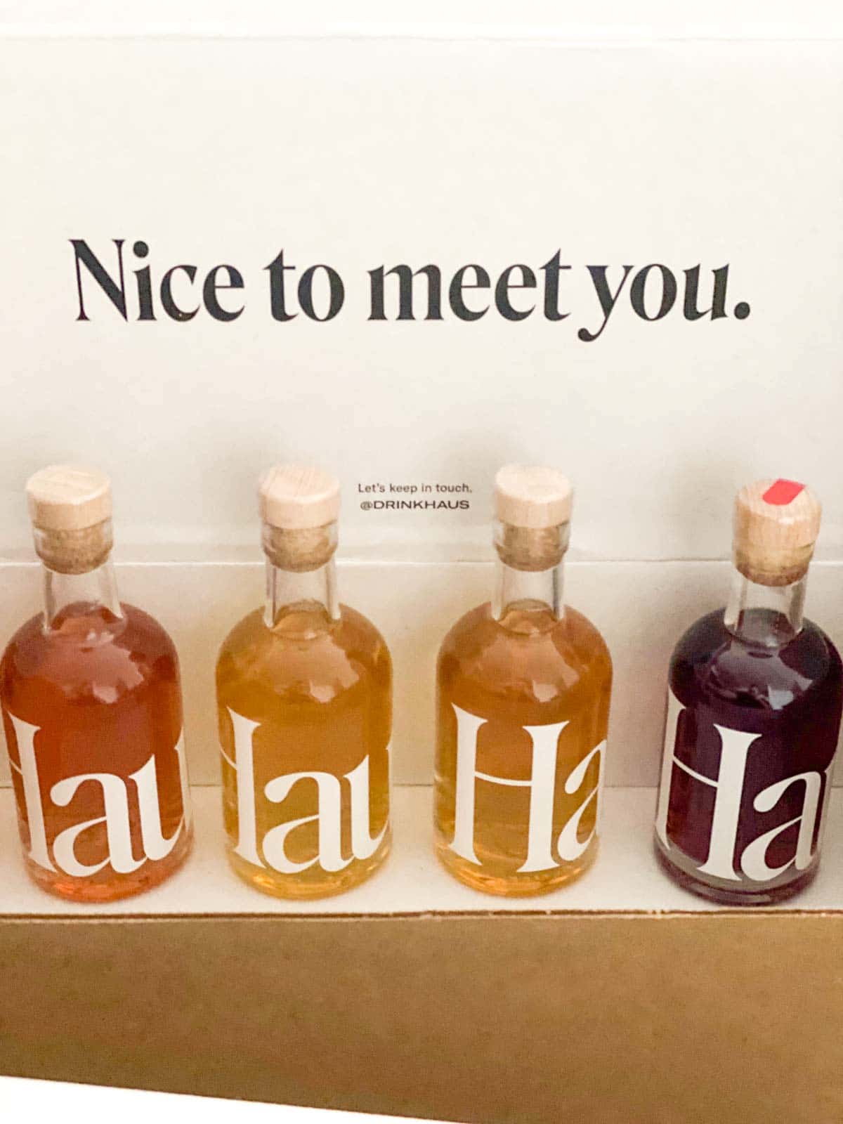 haus sampler kit 4 bottles, with "nice to meet you" on box