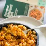 Freshly Farmstead baked lentil pasta with a bite on fork