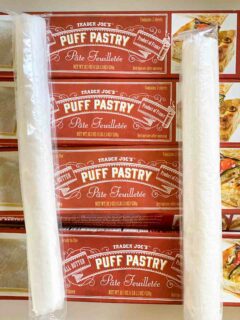 two rolls of puff pastry sitting on trader joe's puff pastry boxes