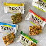 4 flavors of KEHO snack bars with a bite taken out