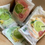 shipment box full of blendtopia smoothie packet flavors
