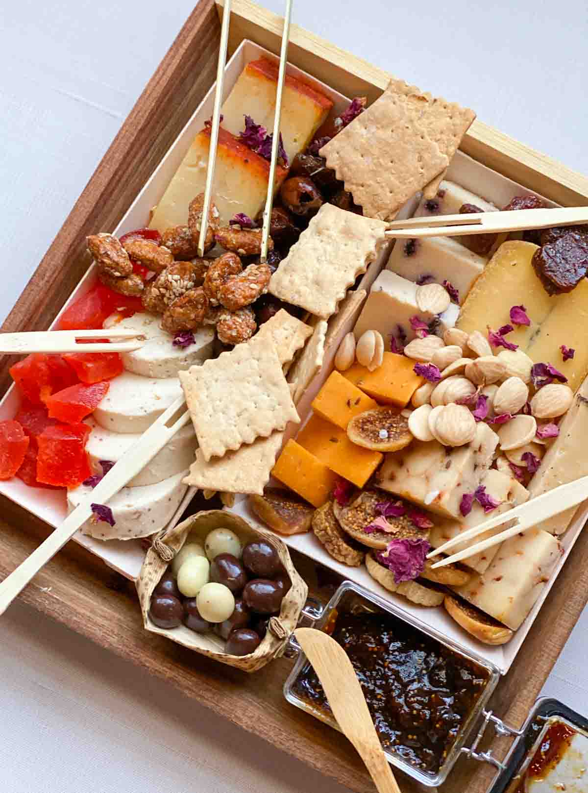 Cicette cheese board from Boarderie, unwrapped and arranged with bamboo cutlery