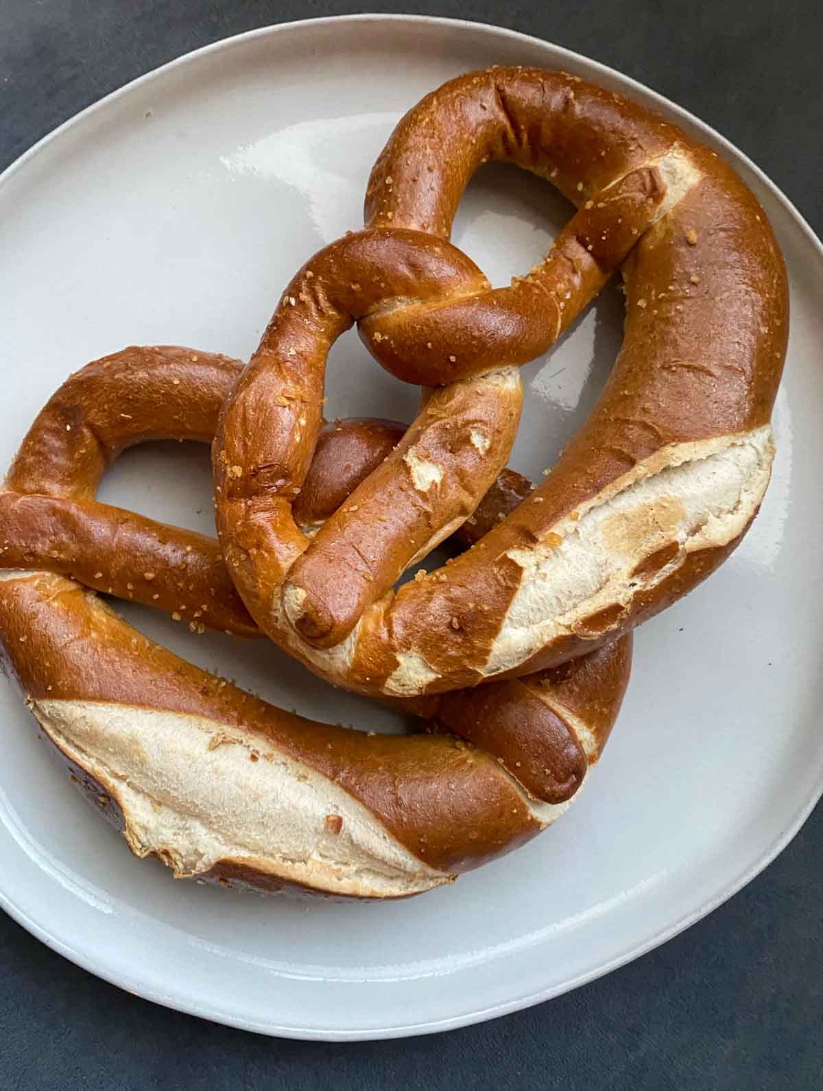 German pretzels from the brot box on white plate
