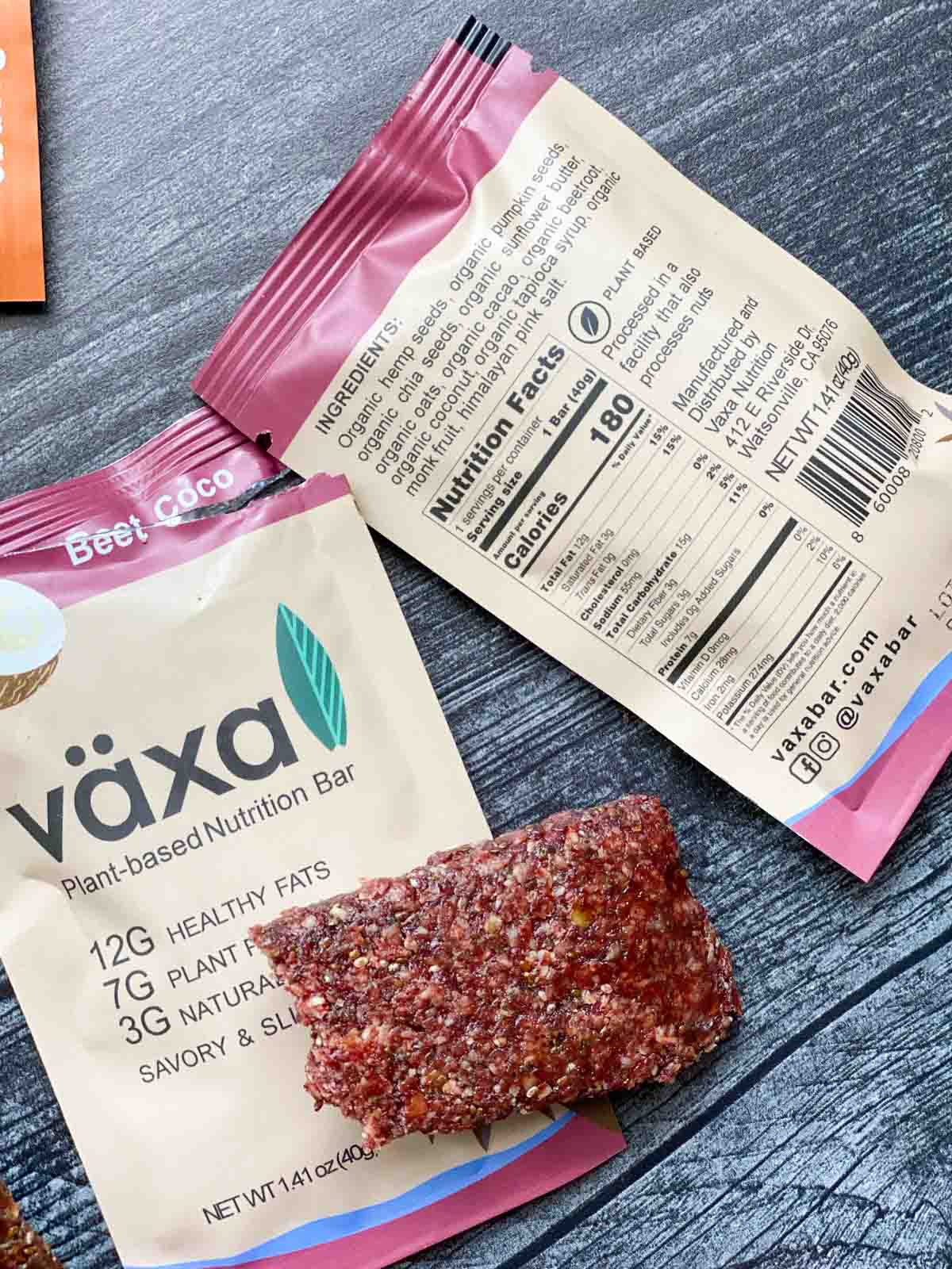 beet coco växa bar unwrapped next to nutrition facts