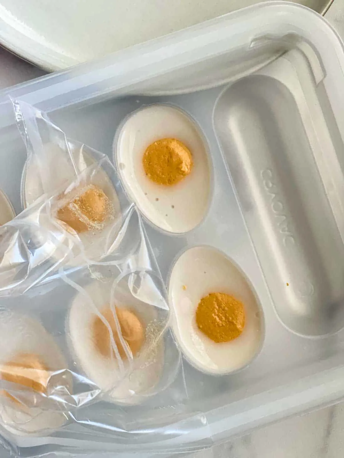 peeling back the plastic on Wunder Eggs packaging