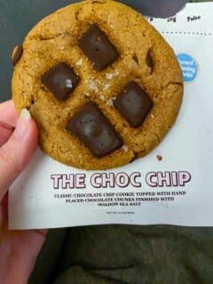 the chocolate chip cookie from nowhere bakery next to packaging