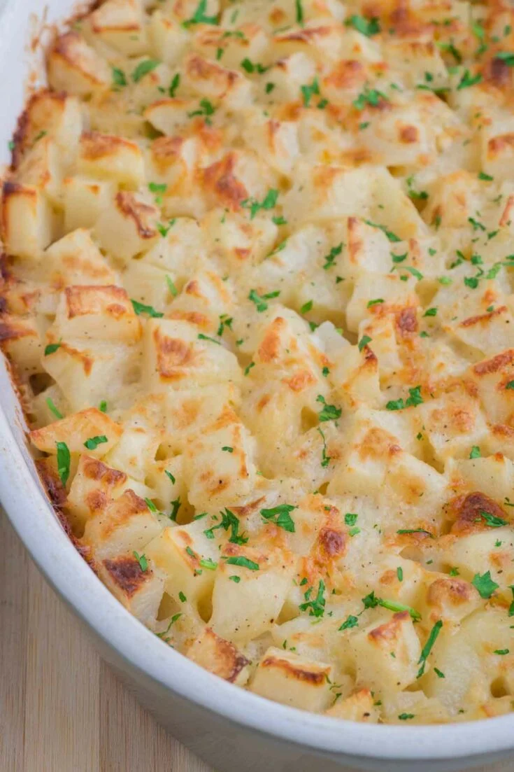 Baked Mississippi Mud Potatoes in white casserole dis.