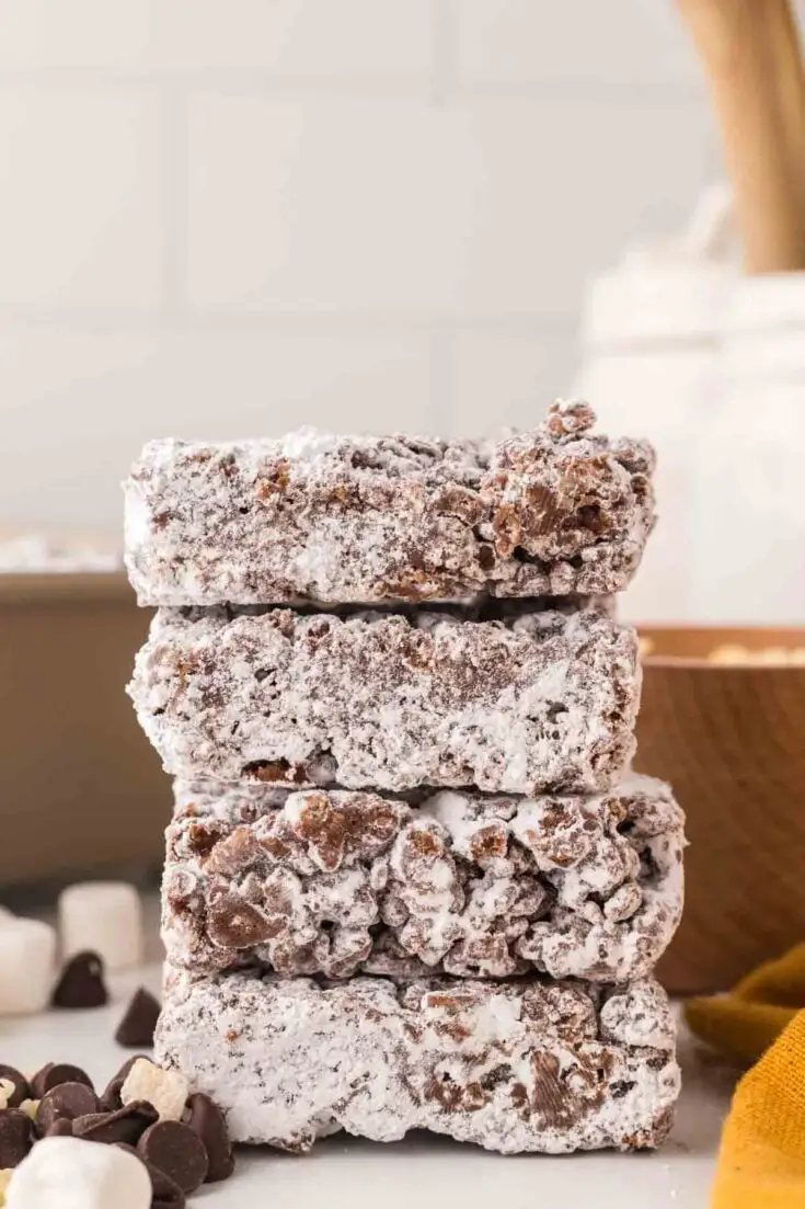 muddy buddy rice crispy treat bars stacked.