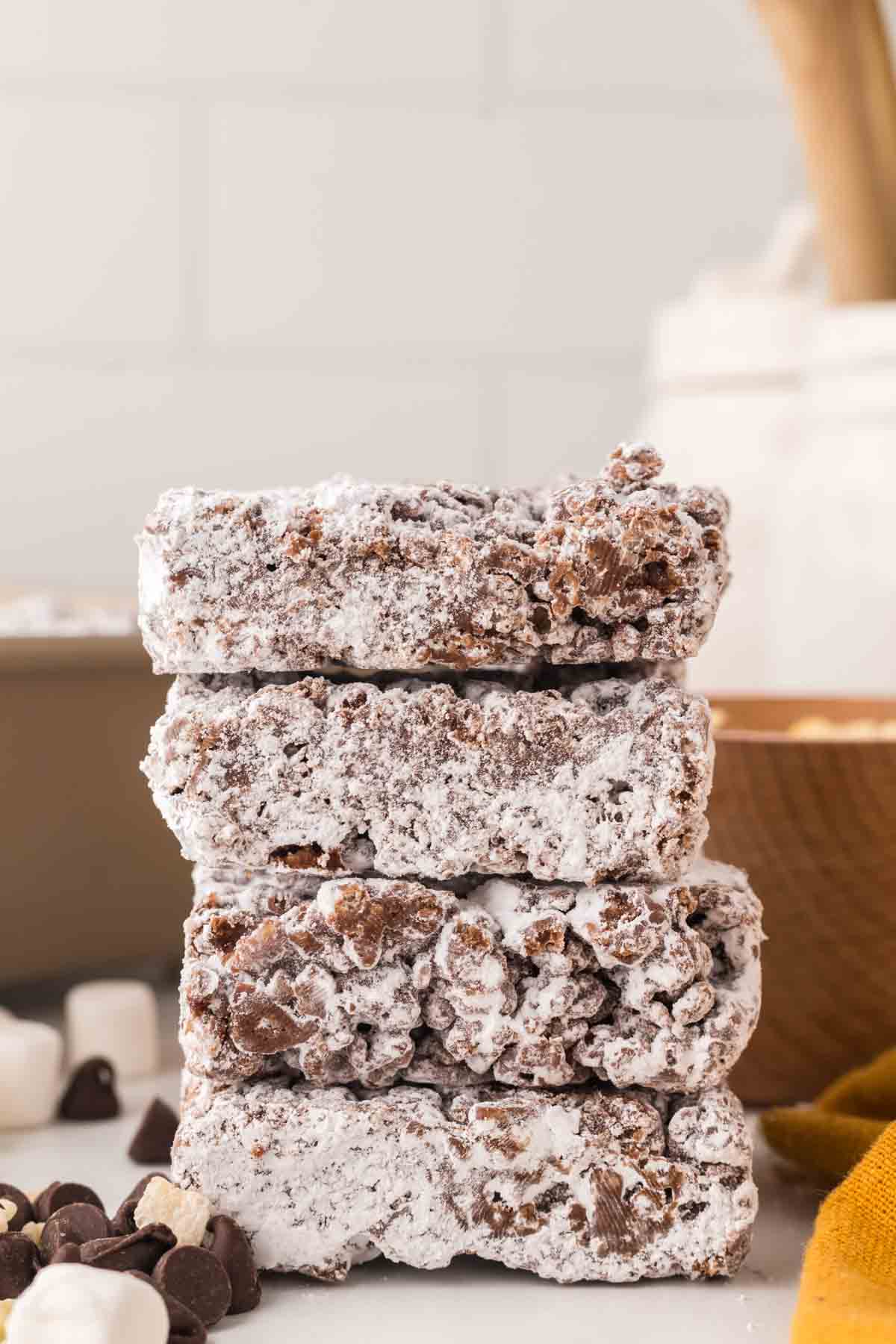 muddy buddy rice crispy treat bars stacked.