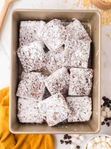 muddy buddy rice crispy treat bars in pan.