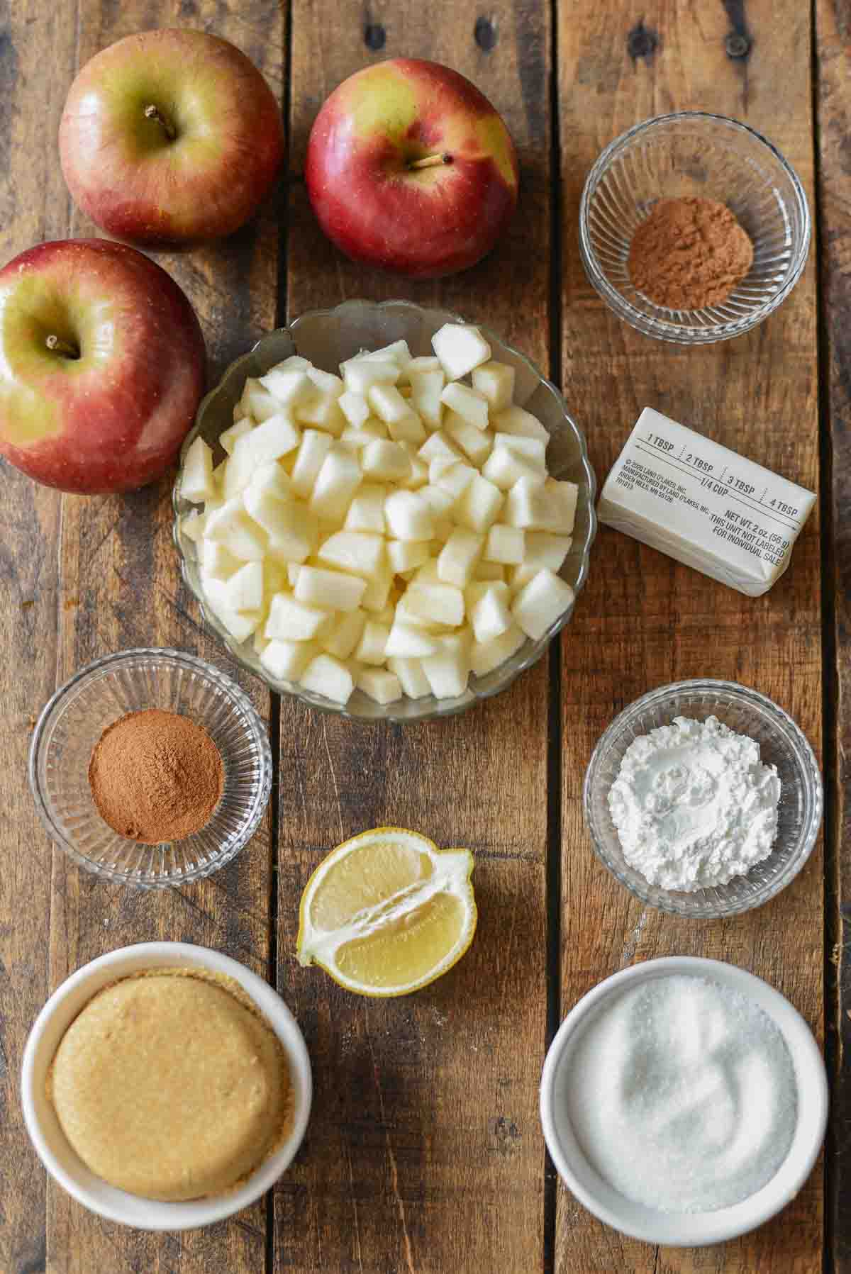ingredients for small batch stovetop apple butter on wood background.